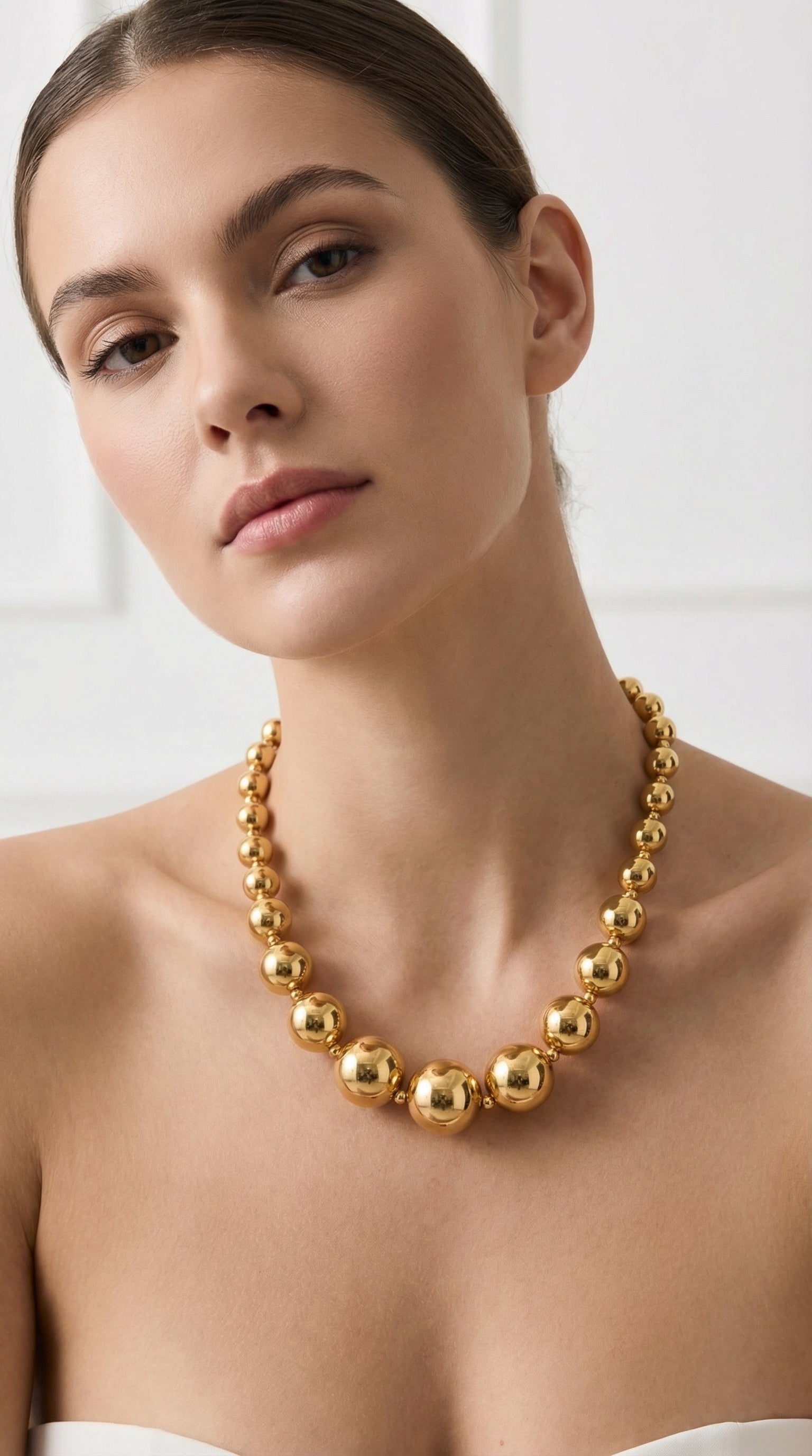 Collar de borlas dorado