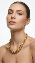 Collar de borlas dorado